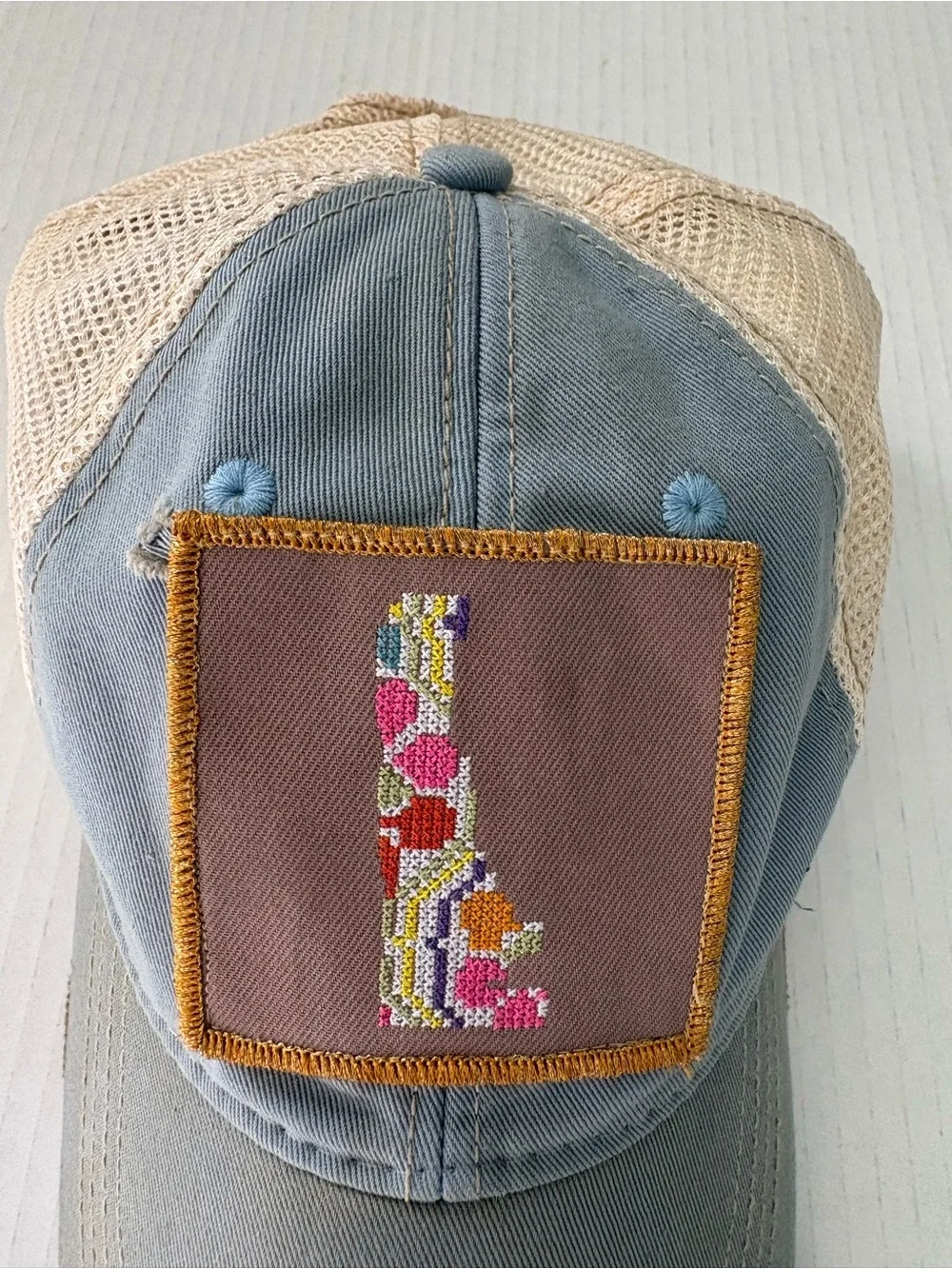 Judith March Distressed Trucker Hat state Delaware embroidery Patch blue tan